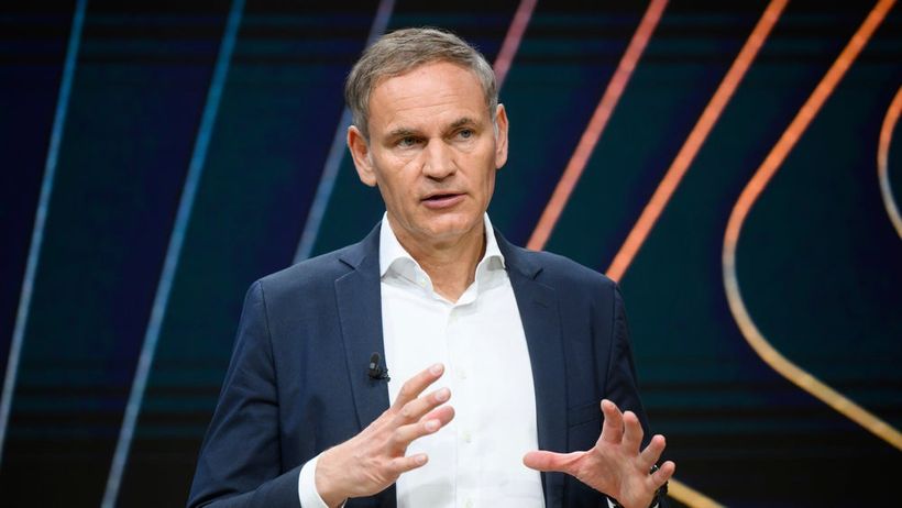 Oliver Blume, Chairman of the Board of Management of Volkswagen AG and Porsche AG, speaks at the Volkswagen Group's annual press conference in the Autostadt, in Wolfsburg, Germany, Monday, March 11, 2025. (Julian Stratenschulte/dpa via AP) LBL802