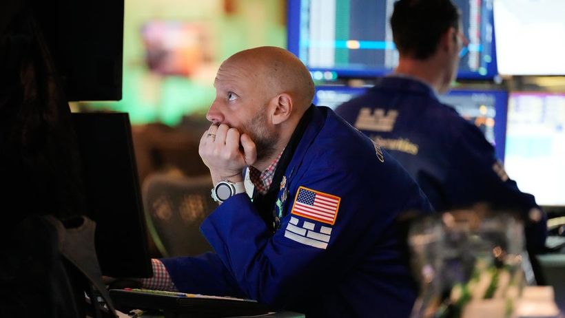 Meric Greenbaum works on the floor at the New York Stock Exchange in New York, Tuesday, March 3, 2026. (AP Photo/Seth Wenig) NYSW103