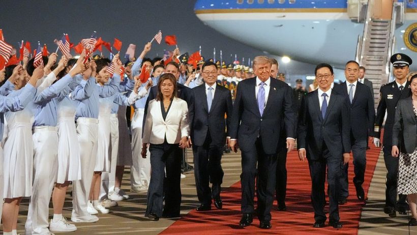 President Donald Trump walks with China's Vice President Han Zheng during a welcome ceremony Wednesday, May 13, 2026, at Beijing Capital International Airport in Beijing. (AP Photo/Mark Schiefelbein) XJE324