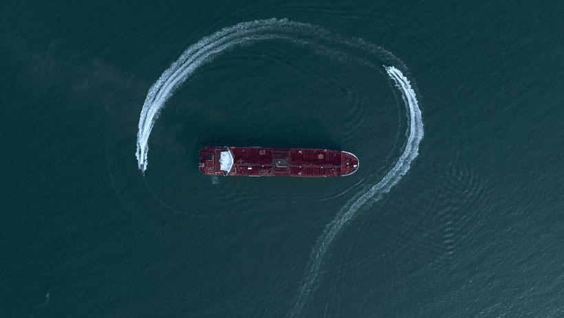  In this July 21, 2019 file photo, an aerial view shows a speedboat of Iran's Revolutionary Guard moving around the British-flagged oil tanker Stena Impero, which was seized in the Strait of Hormuz by the Guard, in the Iranian port of Bandar Abbas.
