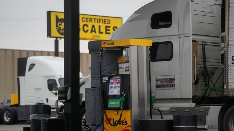 Trucks are parked at a stop and gas station Tuesday, March 3, 2026, in Elk Grove Village, Ill. (AP Photo/Erin Hooley) ILEH118

