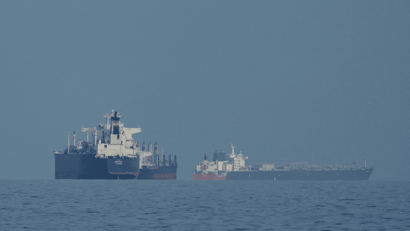 Oil tankers and cargo ships line up in the Strait of Hormuz as seen from Khor Fakkan, United Arab Emirates, Wednesday, March 11, 2026.