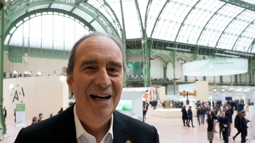 French businessman Xavier Niel speaks in the general atrium during an Artificial Intelligence Action Summit at the Grand Palais in Paris, Monday, Feb. 10, 2025. (AP Photo/Michel Euler) XVM129