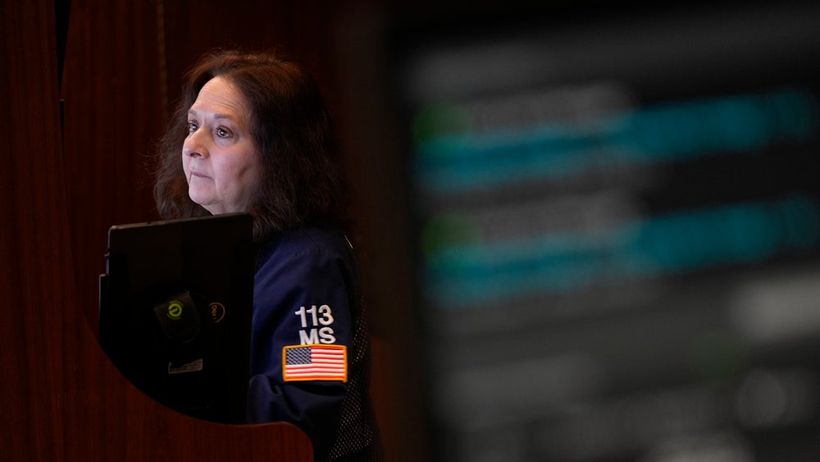 A trader works on the floor at the New York Stock Exchange in New York, Wednesday, Jan. 29, 2025. (AP Photo/Seth Wenig) NYSW107


